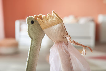 LIFETIME Kidsrooms fabric dolls kissing—one in a pink dress with a crown, the other green—set in a cozy children's bedroom