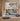 Children's room with a bunk bed, toys, and decorative elements.