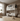 Children's room with a wooden playhouse bed and toys on a wooden floor.